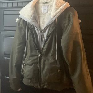 Bomber jacket, with attached hood and sweatshirt insert. Waist length